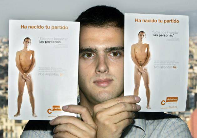 Albert Rivera, a 26-year old lawyer, holds up two campaign posters showing himself naked,  in Barcelona, Spain, Sept. 20, 2006. Plenty of politicians promise to tell the naked truth, but Albert Rivera is taking the cliche literally, appearing nude on a campaign poster as he runs for president of Catalonia. On thousands of posters adorning the streets of Barcelona and other Catalan cities, Rivera is shown naked as the day he was born, covering himself,  fig-leaf style to keep the poster family-friendly. Beside the photo, a caption reads: "We don't care where you were born. We don't care which language you speak. We don't care what kind of clothes you wear. We care about you". (AP Photo/Manu Fernandez)